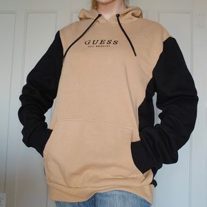 tan and black guess hoodie